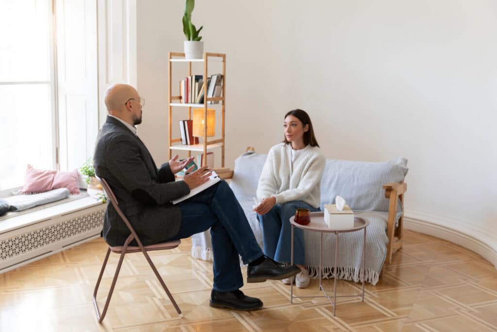une femme dans un fauteuil avant l'hypnose