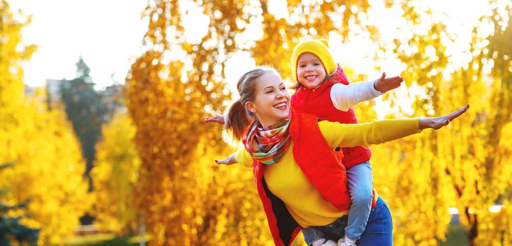 happy family mother and child daughter on autumn walk